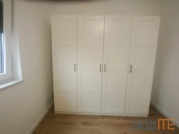 Montaža bijelog IKEA PAX ormara – uspješna zamjena dijelova i završna montaža